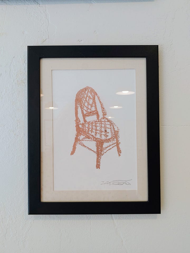 Photo of the drawing of a bistro chair and the same chair on a latte