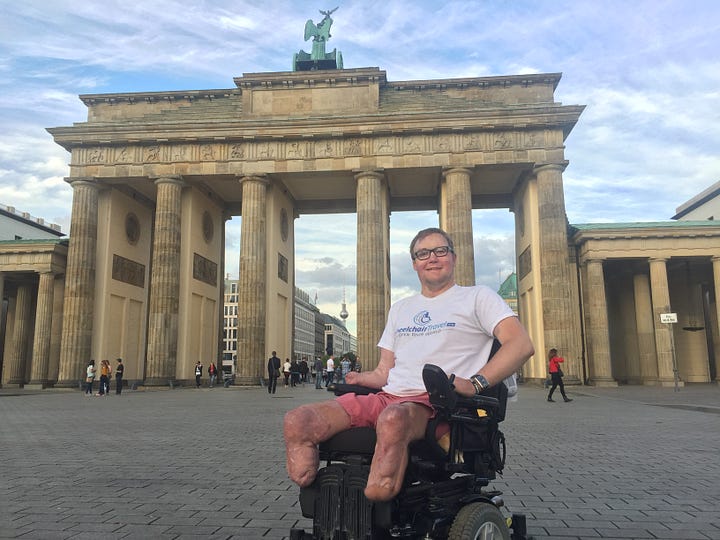 John seated in front of the Brandenburg gate in his wheelchair and a close up photo of the tile work on the Ishtar Gate.