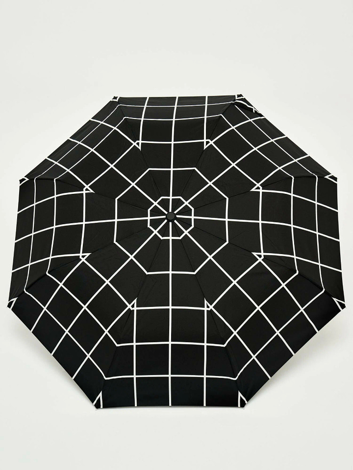 Umbrella and reusable bag set featuring a minimalist black grid design on a white background. A modern, eco-friendly pairing for both rain protection and shopping trips.