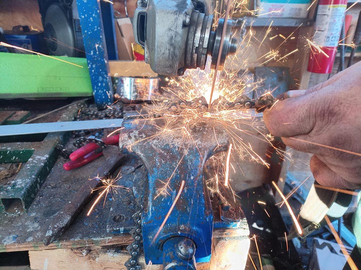 A shot of chainsaw chain being cut with an angle grinder, and another of a bundle of chain warming in the forge.