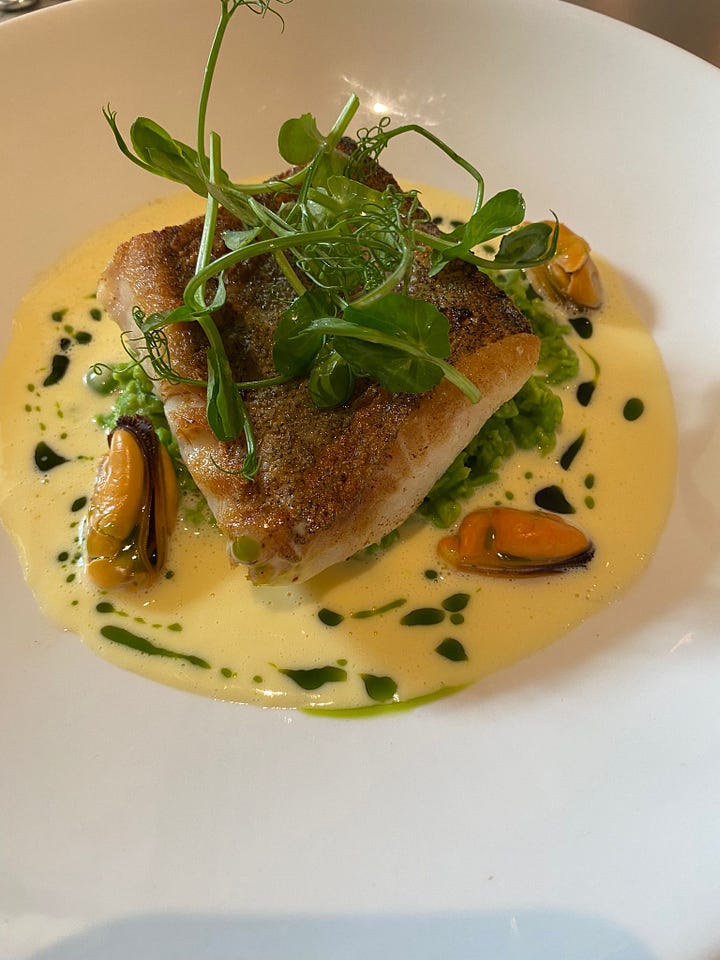 From left: Cornish hake with mussels, fresh oysters on the half shell with salmon roe and jalapeños