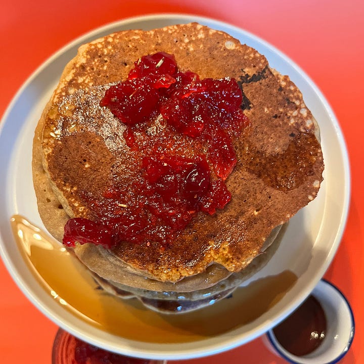 Rye pancakes with fruit and maple syrup
