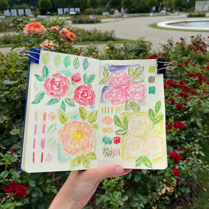 Sketchbook spreads created in pencils and crayons