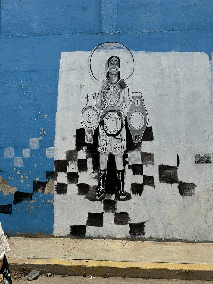 Four images of black and white street art in Oaxaca.