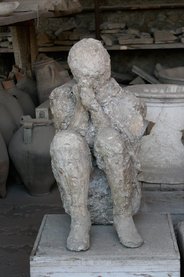 images of the victims and their belongings in Pompeii