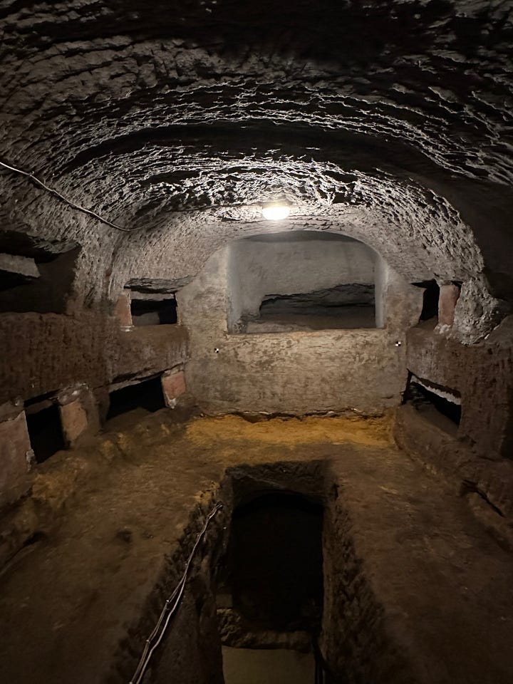 Two views of the catacomb of Saint Sophia. 1, looking up into the chamber from below. 2, looking back into the chamber after having climbed the stair into the space