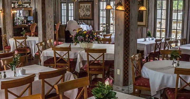 Two photographs of the dining room, a century apart.