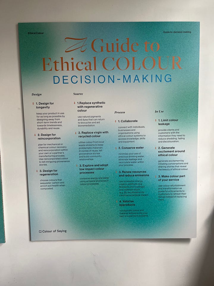 1. Example of the 'summary of resources and energy choices' card sat with sample of the Colours of Walthamstow table for rust; 2. A Guide to Ethical Colour Decision-Making information board.