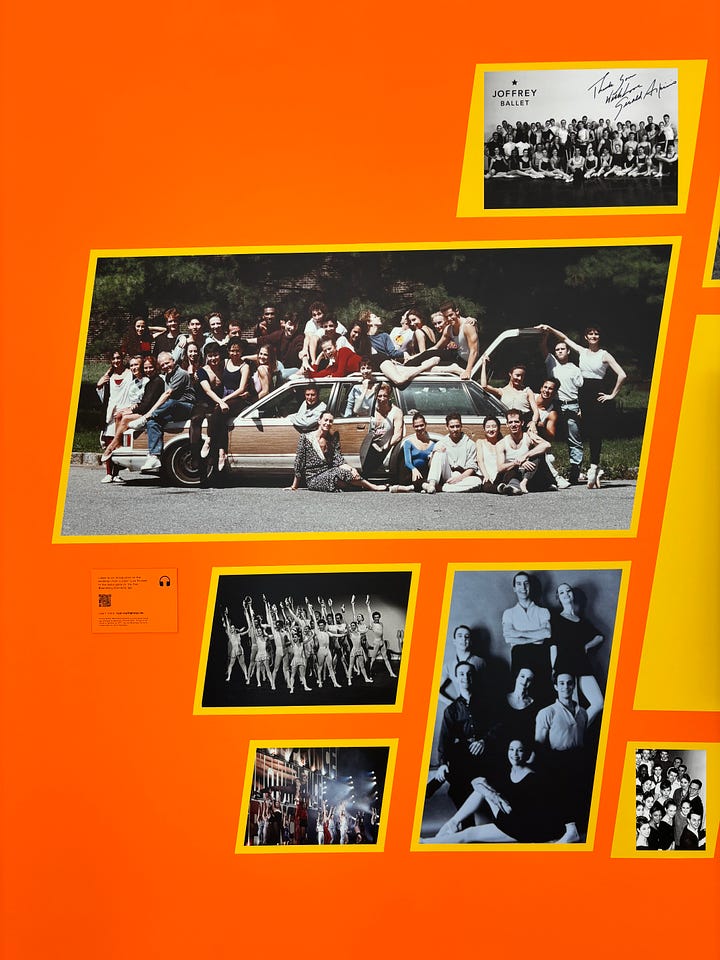 Left: Colorful vintage posters advertising the Alvin Ailey American Dance Theater on a deep red gallery wall of the Whitney Museum. Right: Photos of Joffrey Ballet dancers, some color and some black-and-white, against a bright orange backdrop. In the largest photo, dancers are gathered around and on top of an old station wagon on a sunny day.