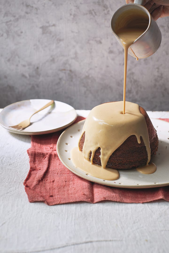 Photo one: Lerato Umah-Taylor holding a plate of puff puffs, or Nigerian "donuts", flavored with dried soaked fruits. Photo two: A Malva pudding (the South African version of sticky toffee pudding), with a pitcher of spiced cream being poured over it.