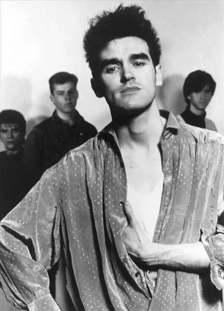 First image: Dingman, Olivia Scout. 11-09-2024. Morrissey Concert. Second image: “The Smiths” Sire Publicity Photo, 1985, Picryl, Public Domain.