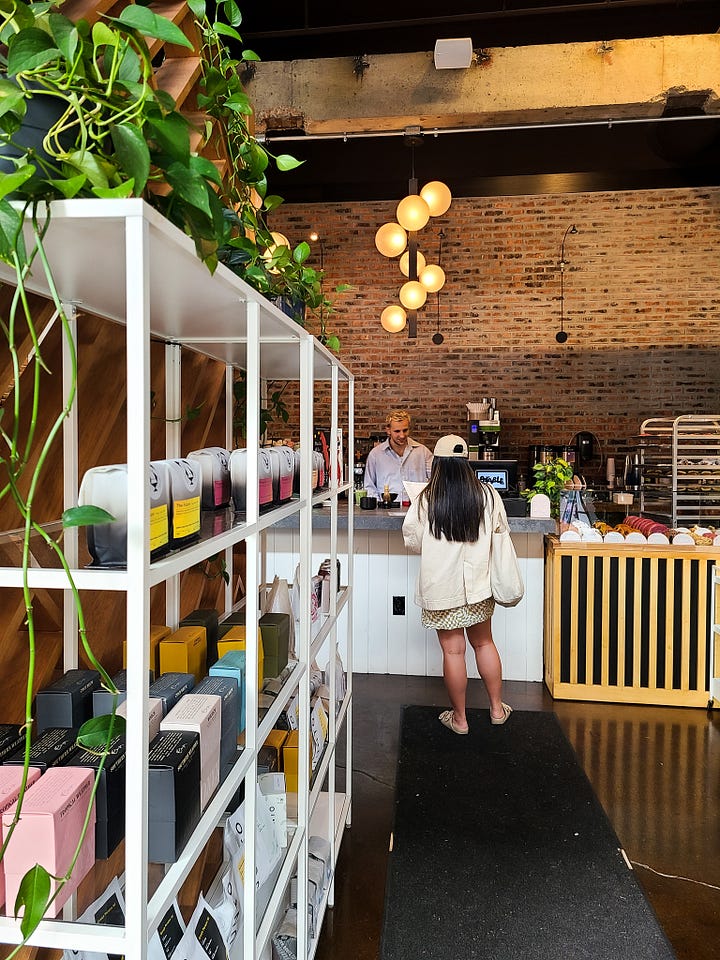 Parable Cafe interior pastry case and front register