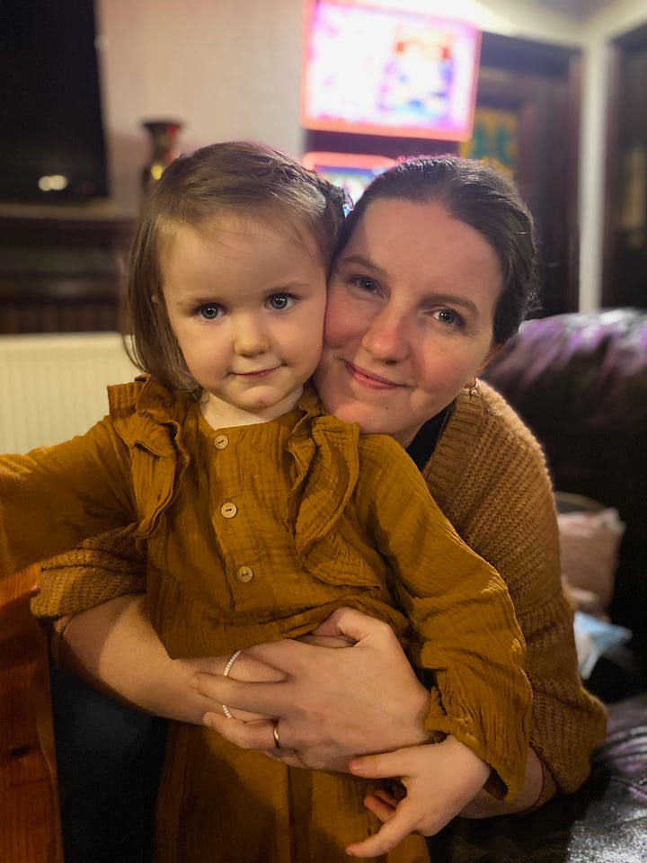 Family with a young girl in a pub in the UK