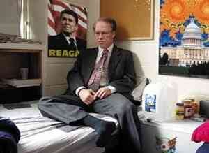 Left: A glum Sen. Wayne Allard sits in his Jefferson Hall dorm room, with a Ronald Reagan poster behind him. Right: Allard and Sen. Tim Hutchinson (R-AR) hang out in the dorm hallway late one night last fall, with Allard reaching into a bag of Doritos.