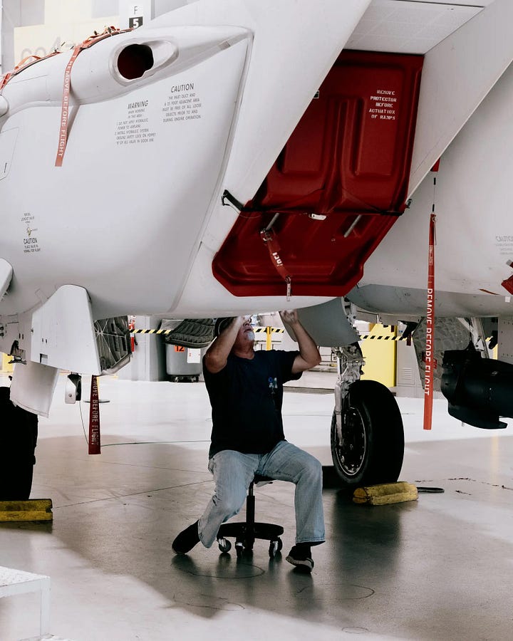 Top Left: Workers building an F-15 fighter jet at a Boeing factory in St. Louis. Worldwide military spending hit $2.2 trillion last year. Top Right: Boeing’s facilities in St. Louis. The company predicted that a larger share of its revenues and profits will come from international arms sales. Photos: Bryan Birks for The New York Times. Bottom Left: South Korea’s Chunmoo missile system was on display at the military show in Poland. Photo: Maciek Nabrdalik for The New York Times. Bottom Right: Boeing’s facilities in St. Louis. The company predicted that a larger share of its revenues and profits will come from international sales. Bryan Birks for The New York Times.