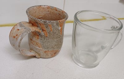Four mugs with surface textures of lumpy, bumpy, rough, and smooth