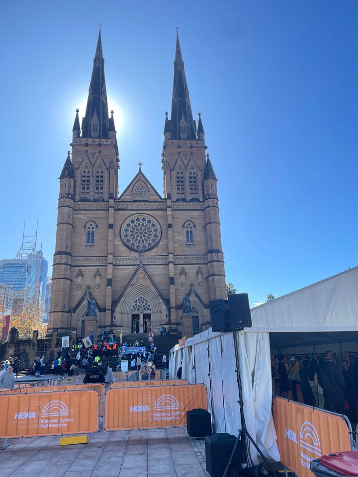 HOKA Runaway Sydney Half Marathon, worshipers and runners in front of St Mary’s Cathedral 
