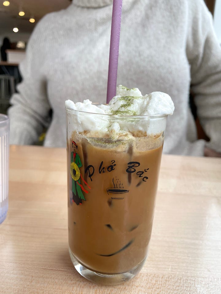 a waffle with coconut cream and an iced coffee with coconut cream