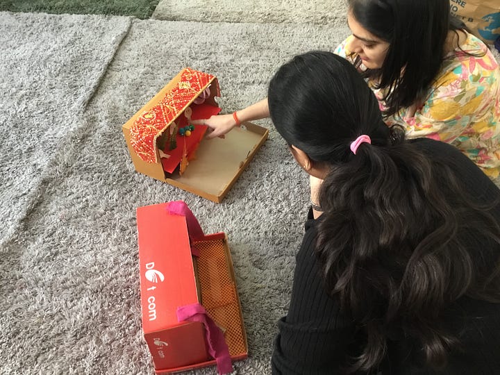 Participants on the NDP India course making puppets