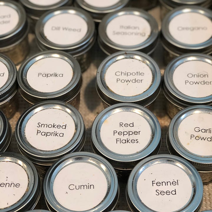 Labelled container tops and spice jars. 