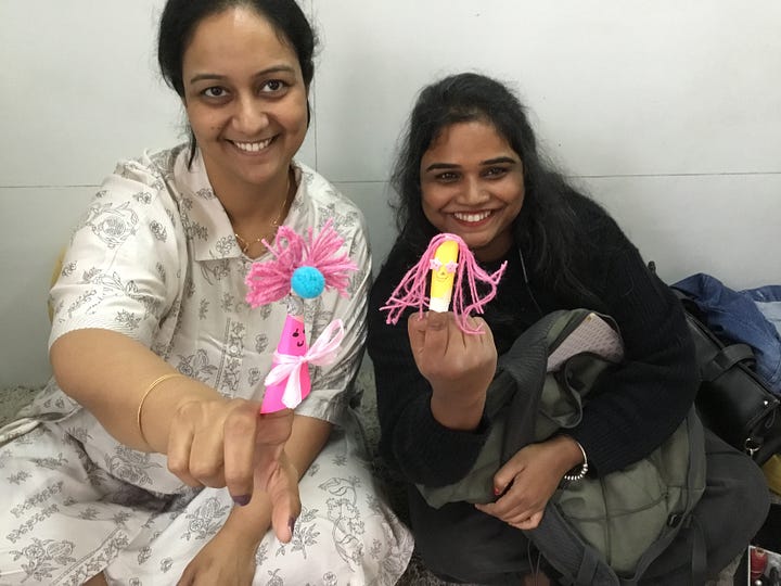 Participants on the NDP India course making puppets