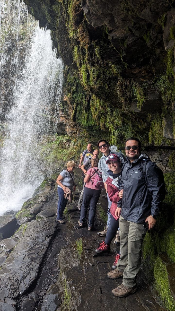 waterfalls and hikers in the brecon beacons with wales outdoors