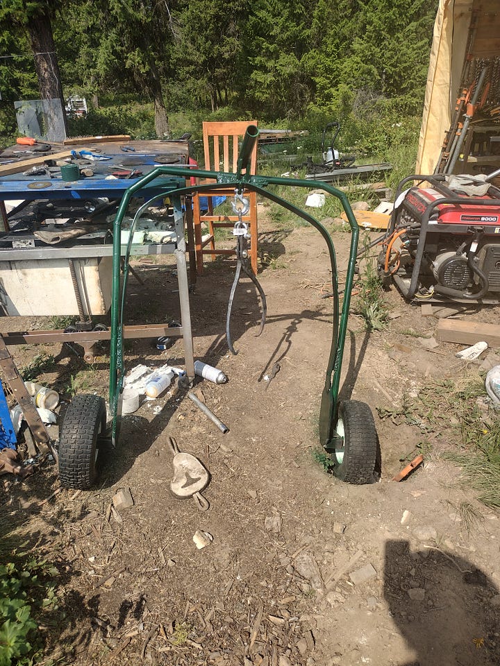 A shot of the hub welds, and another of the assembled log arch.