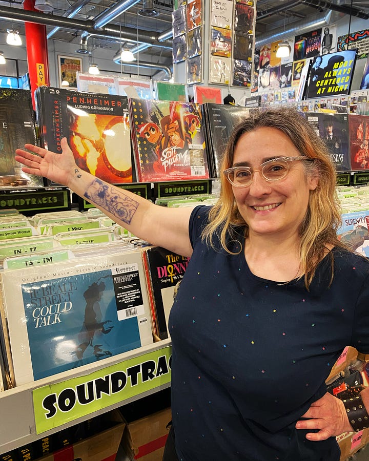 A battle between a tie fighter and the millenium falcon in outer space next to an image of Cecil wearing a blue shirt and holding out her arm sporting a tattoo in front of vinyl records