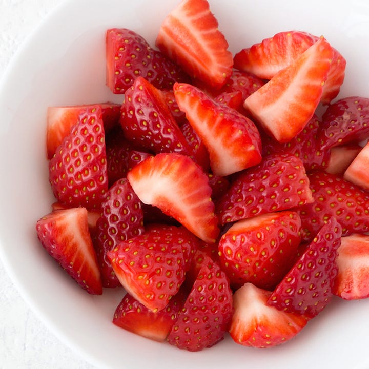 hulled strawberries and sieving blended strawberries 