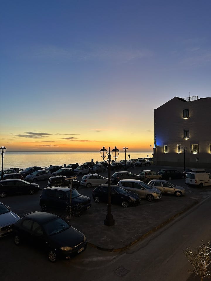 Sunset view from the Algilà Ortigia Charme Hotel + cannolo aracini breakfast: Gillian Knows Best Guide to Ortigia