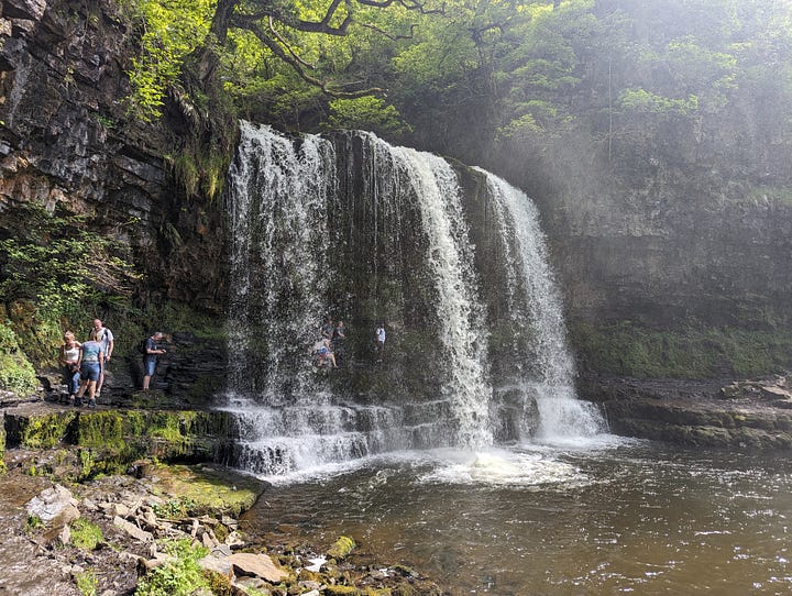 waterfalls in the brecon beacons sunshine