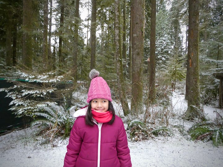 Left: girl standing in snowy forest of North Vancouver; Right: the cabin at Camp Campilano, with a dusting of snow.