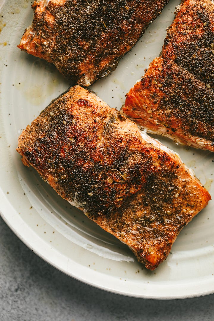 Za'atar salmon with the harvest slaw salad plated.