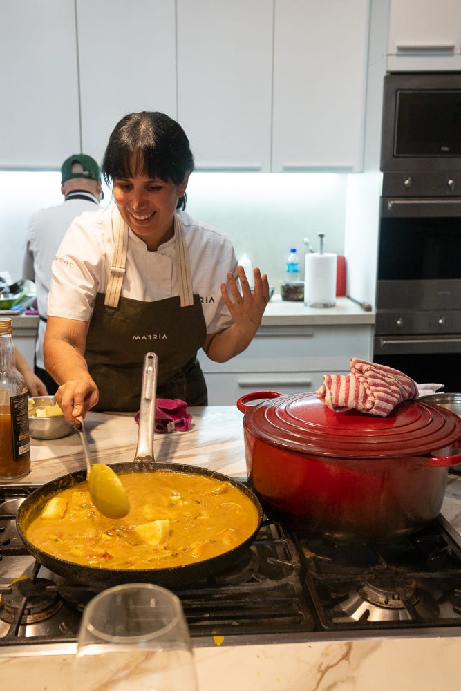 The centerpiece dish, large hunks of pork in a yellow sauce with two kinds of Peruvian peppers and yucca.