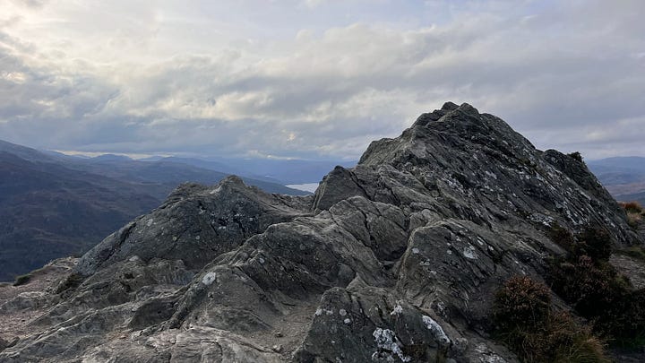 A few photographs from the the top of Ben A’an. The large loch is Loch Katrine and the smaller one behind the tent is Loch Achray.