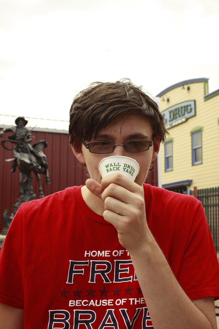 A photo of a girl on a statue of a jackalope, two photos of a boy and a girl getting cups of water, and a boy drinking water from a cone shaped cup.