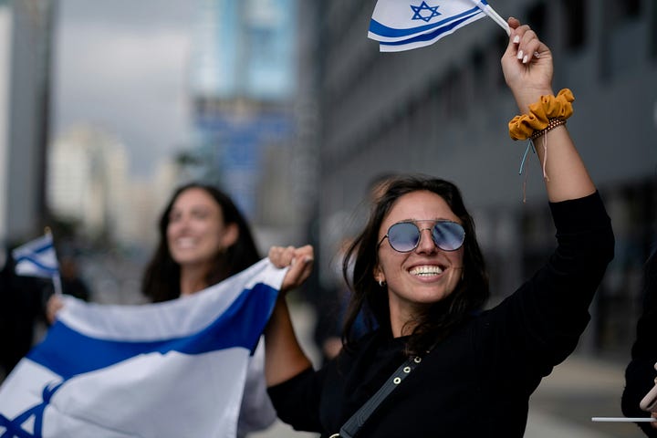 picture 1, prayer book and memorial candle; picture 2, womn waving Israeli flags