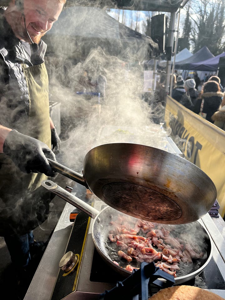 Chef Ben from Tonbridge cooking on stage with The Lemon Grove's Bruce McMichael