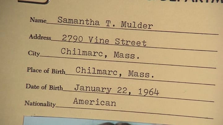 Scully looks at the Mulder family report, featuring frames depicting Fox and Samantha.