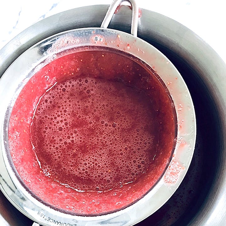 hulled strawberries and sieving blended strawberries 