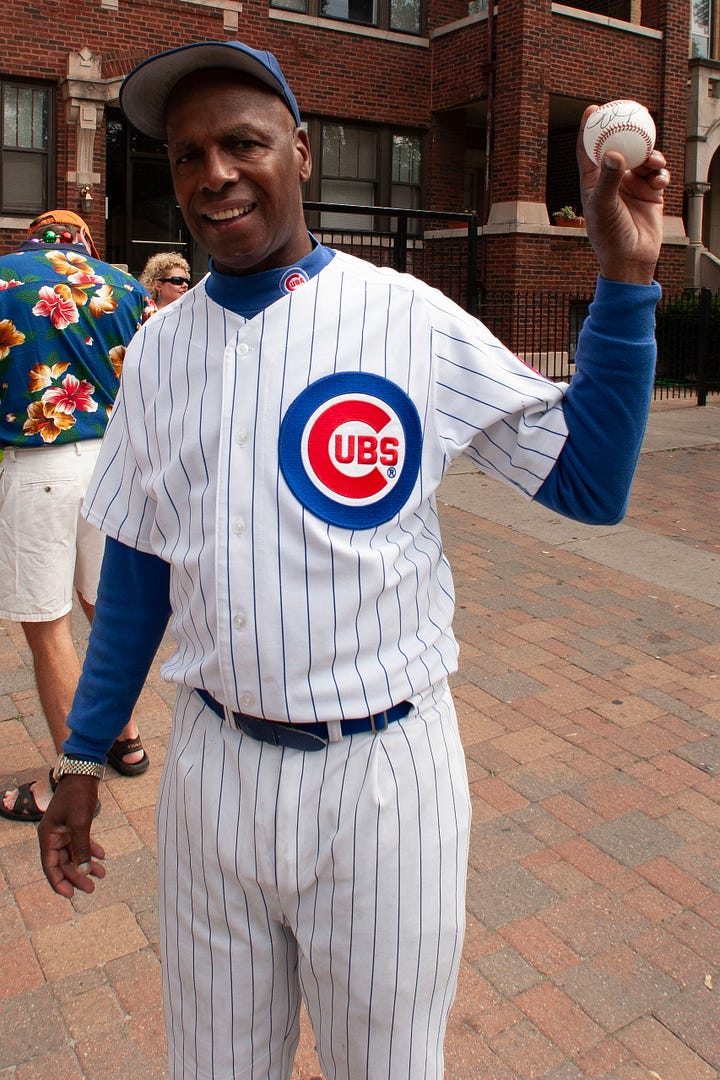 Jimmy Buffett meets Cubs super fan, Ronnie Woo Woo outside Wrigley Field, 2005. Photo: matt carmichael/rocknroll.net
