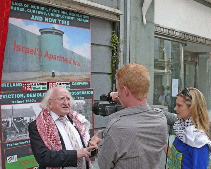 Irish President Michael D. Higgins wears a Keffiyeh while speaking to the press about Israel's apartheid regime.