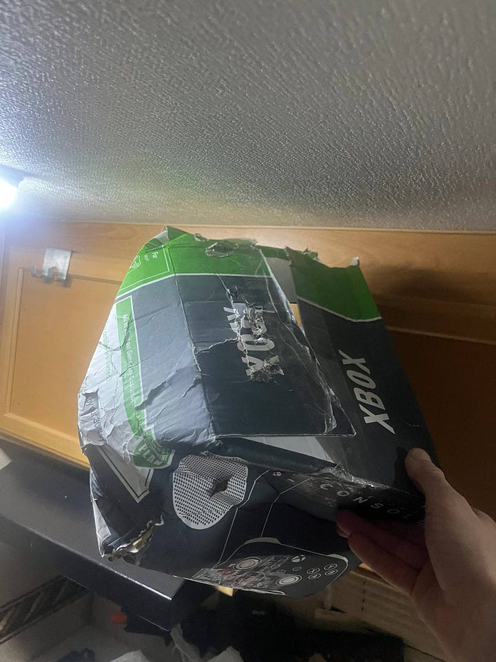 Battered Xbox Series S box and hoodie