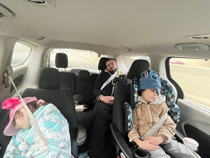 Daughter Donna Rose, granddaughter Tallulah, and son Jimmy CRASHED OUT in the minivan; Me, perfectly perfect at 51.