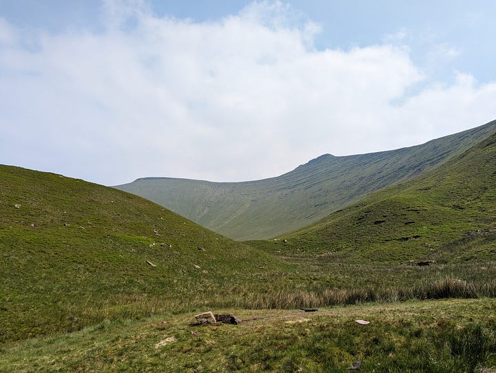 wild swimming on pen y fan in the brecon beacons