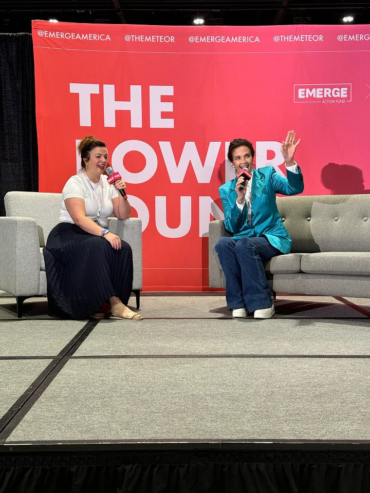 Amber and Lynda Carter speak onstage.