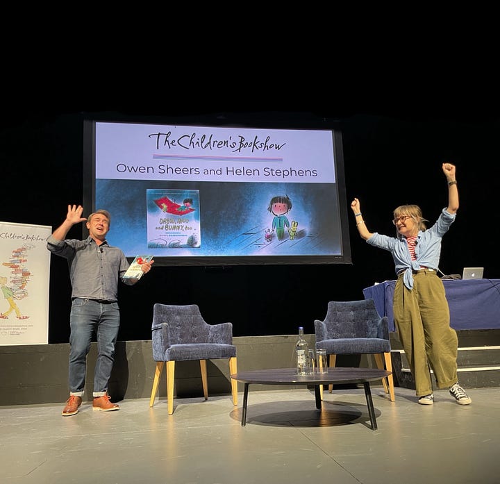 Owen sheets and Helen Stephens on stage at the children’s book show