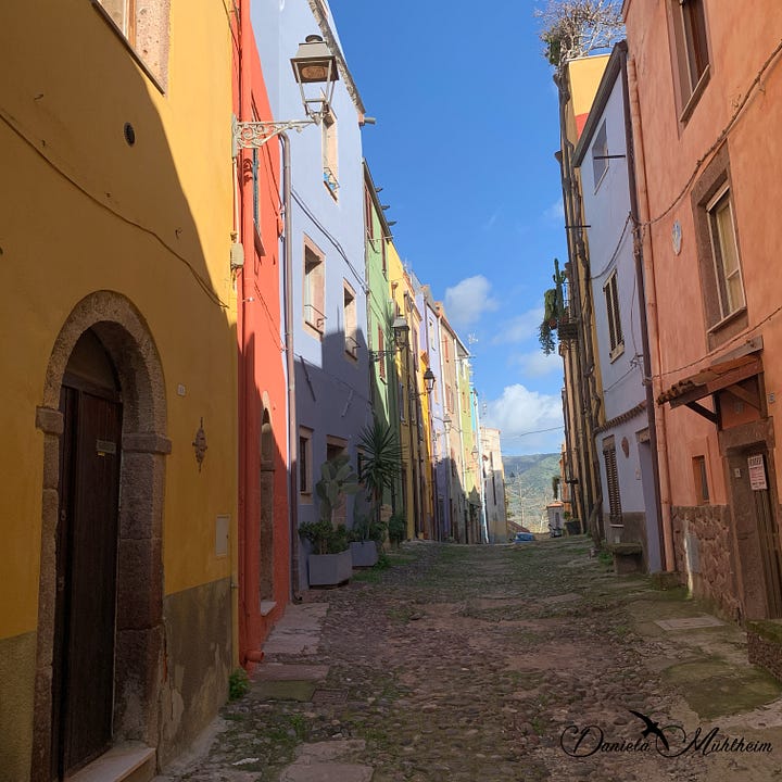 Colourful houses in the narrow streets of Bosa