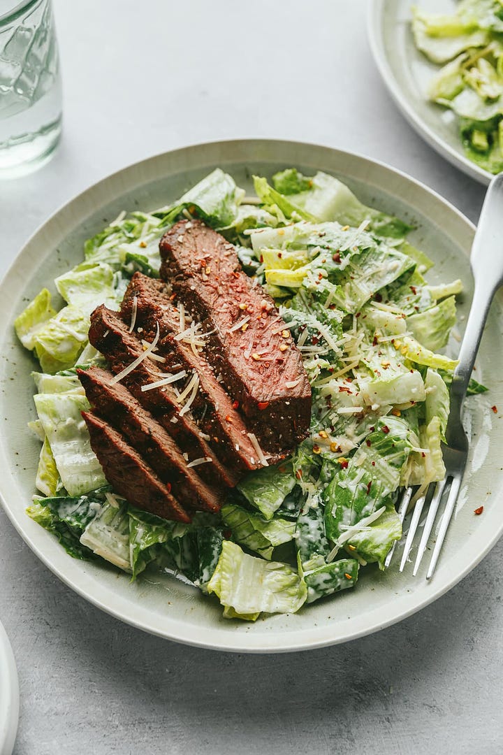 Steak Caesar salad and keto peach cobbler.