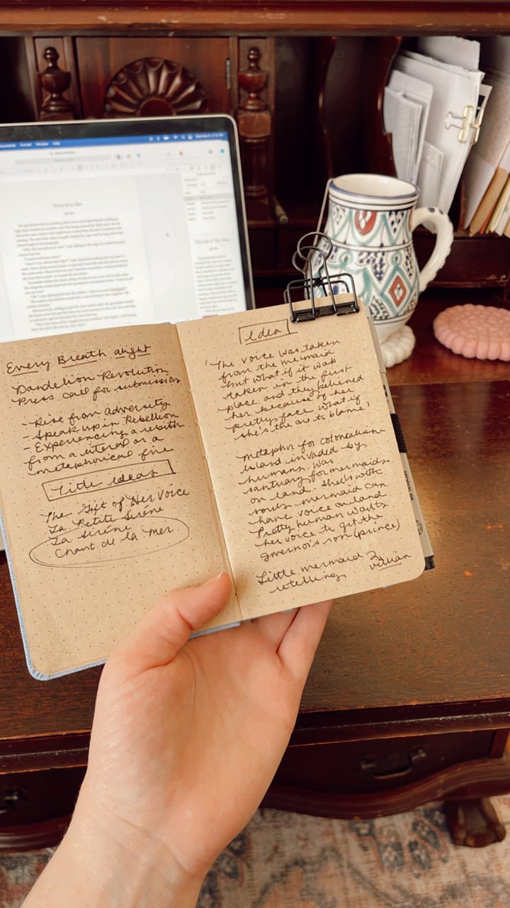 handwritten draft in a notebook next to the final published version